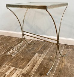 A Brass Side Table With Glass Top