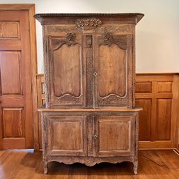 An Antique French Carved Oak Set-back Armoire - Early 19th Century - Intricate Detailing