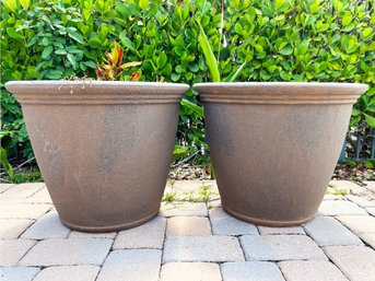 A Pair Of Resin Planters