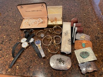 Assortment Of Belt Backless, Watches, Pipes And More.