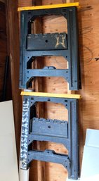 A Pair Of Folding Sawhorses