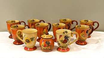 Lot Of Ten Maxcera Coffee Mugs, Eight Orange Rooster And Two Red Rooster And A Lidded Sugar Bowl
