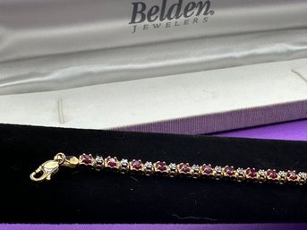 10K Yellow Gold Bracelet With 21 Diamonds And 21 Rubies