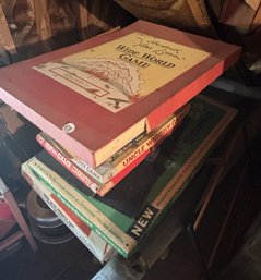 ANTIQUE GAME LOT INCLUDES MONOPOLY, UNCLE WIGGILY, HENDRICK VAN LOONS WIDE WORLD, AND MORE