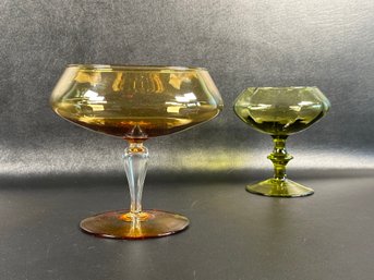 An Elegant Pair Of Vintage Footed Compotes In Amber & Green Glass