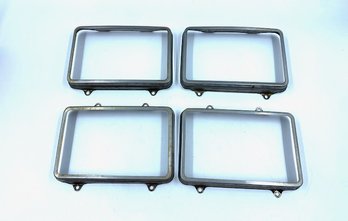 Vintage Grouping Of Headlight Bezels From A Monte Carlo