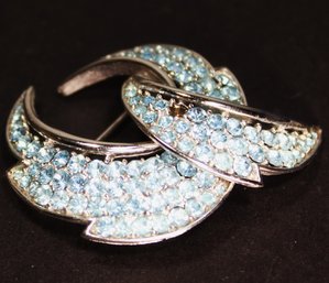 Signed 'TRIFARI' Rhodium Plated Brooch Having Blue Rhinestones