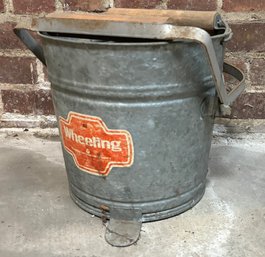 A Vintage Mop Bucket By Wheeling