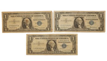 1957, 1957A, 1957B One Dollar Silver Certificates With Blue Seals