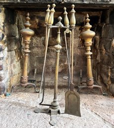 A Set Of 19th Century Brass Fireplace Tools And Andirons