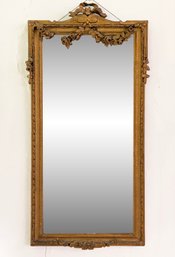 An Antique Louis XVI Gilt And Plaster Framed Beveled Mirror