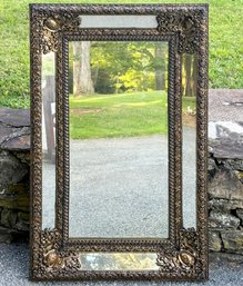 An Elegant Antique Repousse Brass And Glass Framed Mirror