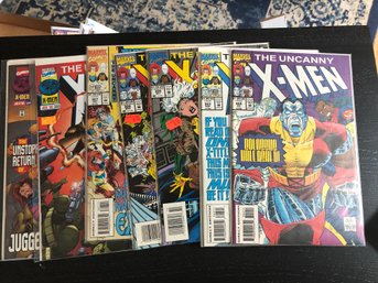 7 Uncanny X-men Comics.  Issue #302,303,305,306,307,333,334.   Lot 124