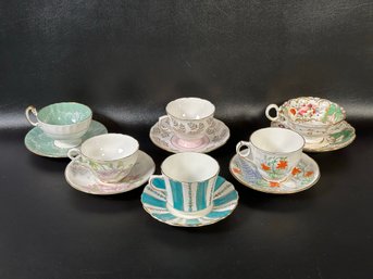 An Assortment Of Vintage Mix & Match Teacups With Saucers