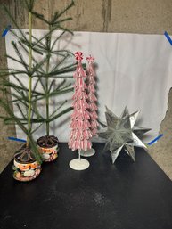 FOUR DECORATIVE CHRISTMAS TREES AND ONE STAR