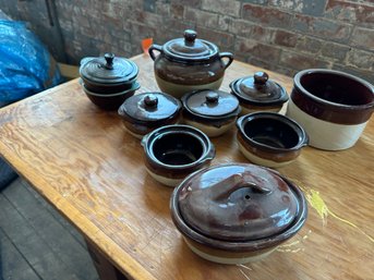 Group Of Brown Casseroles And Soup Bowls