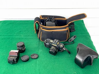 Canon T70 Multiple Program AE With Case, Extra Lens, And Flash Attachment