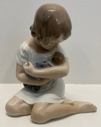 Royal Copenhagen Girl With Doll In Her Arms Figurine