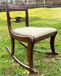 A 19th Century Carved Mahogany Rocking Chair