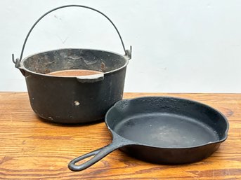 A Antique Cast Iron Bean Pot And Frying Pan
