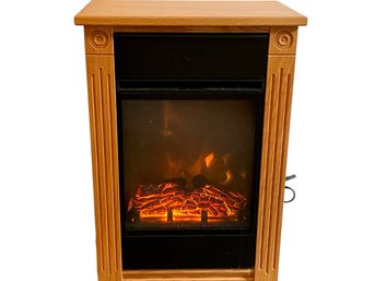 Heat Surge Movable Electric Fireplace. MFG Specs In The Photos