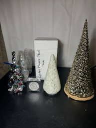 THREE LIGHTED DECORATIVE CHRISTMAS TREES AND ONE GOLD TREE