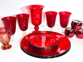 A Collection Of Red Glassware From Pier 1 Imports
