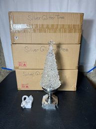 FOUR SILVER GLITTER TREES