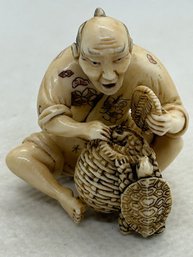 Wonderful Antique Japanese Netsuke- Old Man Trying To Catch Turtle In Basket- Artist Signed
