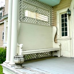 A Pair Of Antique High Back Porch Settles With Clover Leaf Detailing