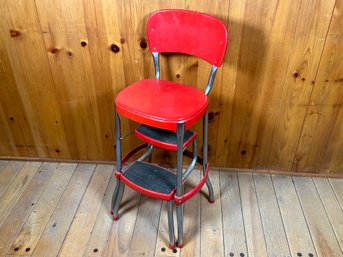 A Red Metal Cosco Step Stool Chair