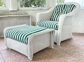 A High Quality Wicker Chair And Ottoman By Lloyd Loom