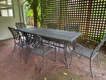 Black Wrought Iron Mediterranean Outdoor Dining Table And Cast Aluminum Chairs