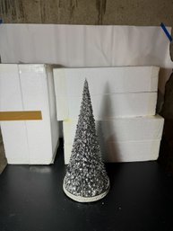 FOUR LARGE DECORATIVE CHRISTMAS TREES