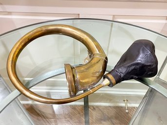 An Antique Brass Bicycle Horn