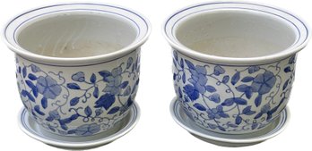 A Pair Of Blue And White Porcelain Flower Planters With Underplates