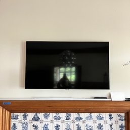 A 49' Samsung Smart TV - Family Room - UN50TU8000