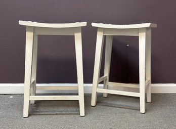 A Pair Of Rustic Saddle Stools
