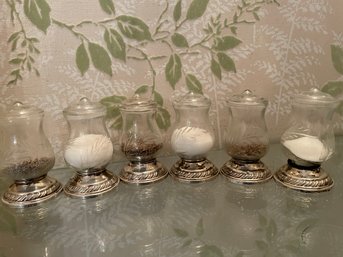 Three Pairs Of Weighted Sterling And Glass Salt And Pepper Shakers. ( Corner China Cabinet A)