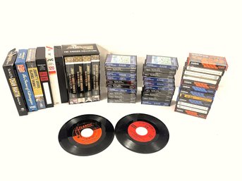 Twenty NOS Elton John Cassettes, Two 45's W Rock And Roll Hoochie Koo, NOS Johnny Carson VHS Collection & More