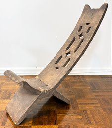 An Antique African Carved Wood Chair