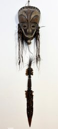 A Vintage Carved Oceanic Mask And Spear