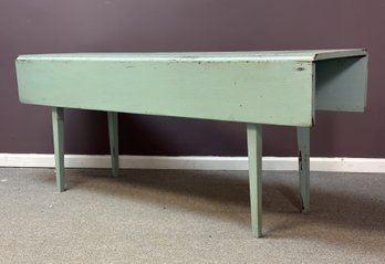 A Vintage Drop Leaf Table In A Fun Turquoise Blue