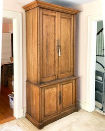 An Early 20th Century Paneled Oak China Or Linen Cabinet