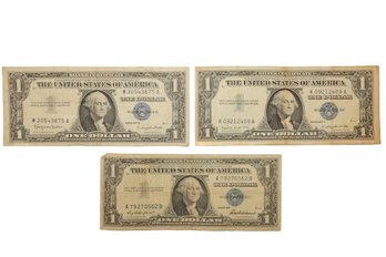 1957, 1957A, 1957B One Dollar Banknotes With Blue Seal