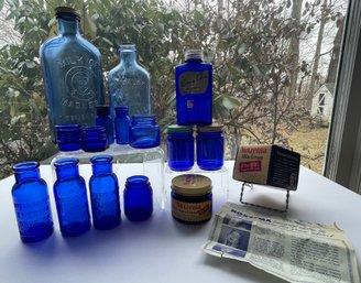 Lot Of 15 Cobalt Jars/bottles Embossed Advertising Including A Complete Vintage NOXEMA In Box With Pamphlet