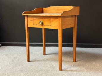 An Antique Stand In Pine