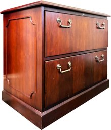 A Two Drawer File Cabinet In Mahogany And Brass