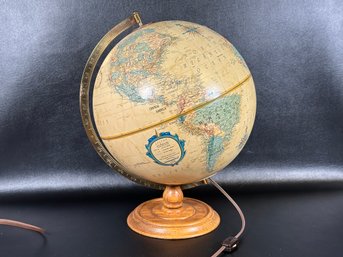 A Vintage Lighted Globe On Stand By Replogle