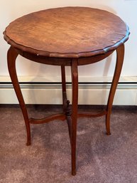 Antique Round Wooden Piecrust Table With Two Decorative Tablecloth Covers